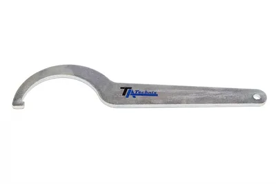 Échelle de réglage pour étrier à ressort en bobine