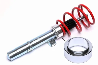 Adaptateur en aluminium pour le réglage de la hauteur des étriers à ressort.